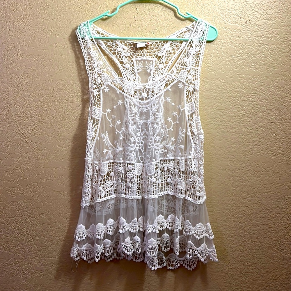 Sleeveless flowy lace tank top.